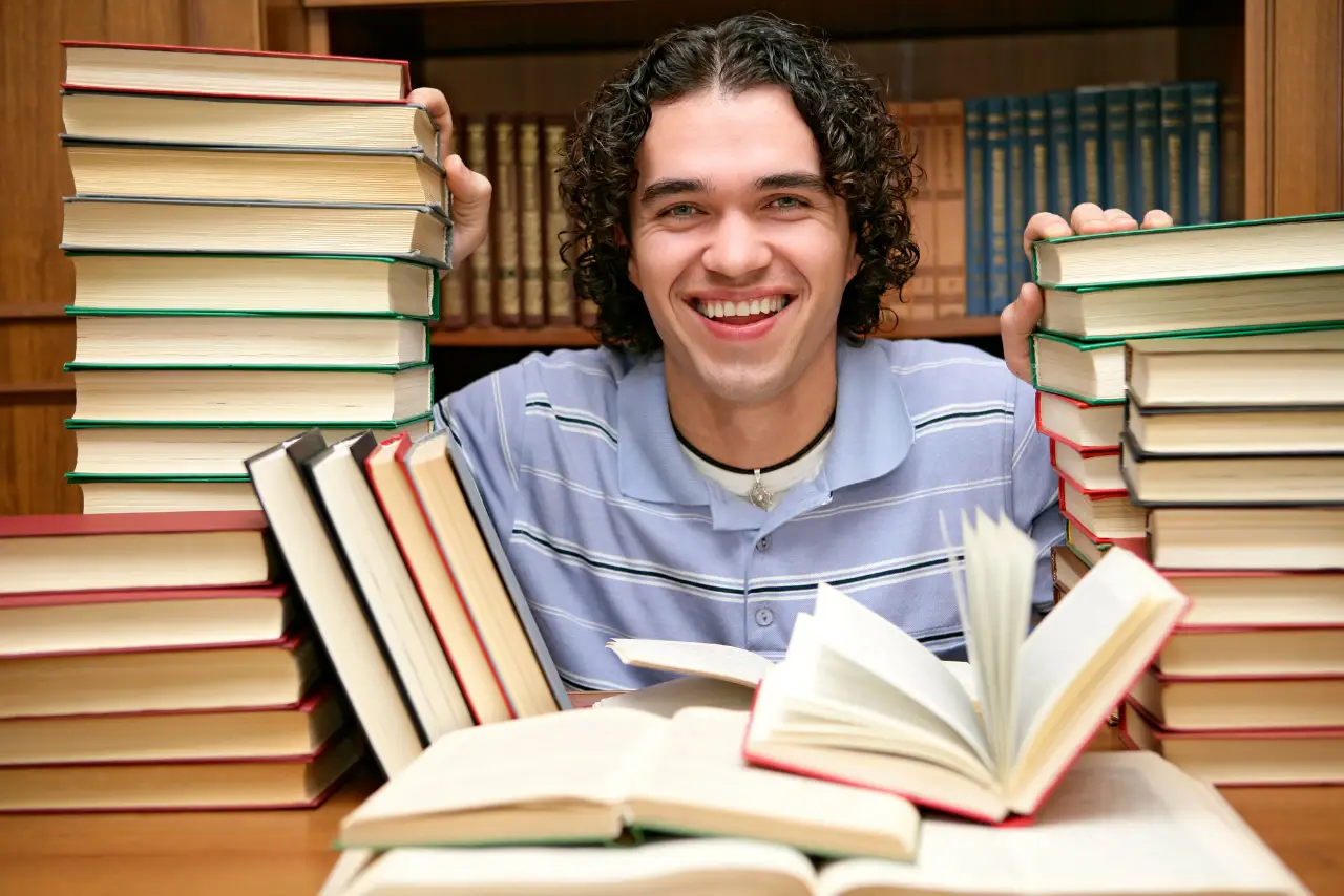 Wide landscape of a sunrise mountain ridge with a solitary walker in silhouette, 3:2 framing to communicate spaciousness and personal growth themes, crisp clarity and natural colors.