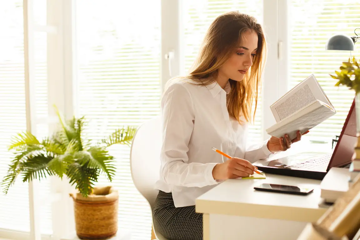 Wide landscape of a sunrise mountain ridge with a solitary walker in silhouette, 3:2 framing to communicate spaciousness and personal growth themes, crisp clarity and natural colors.