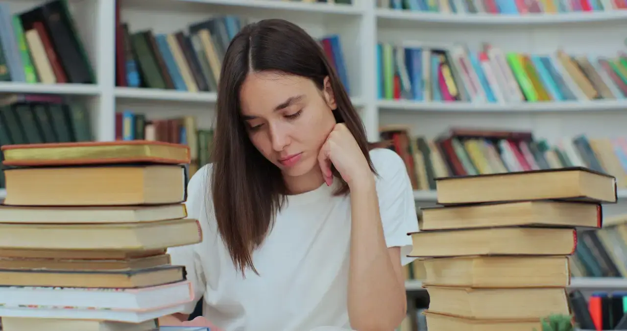 Wide landscape of a sunrise mountain ridge with a solitary walker in silhouette, 3:2 framing to communicate spaciousness and personal growth themes, crisp clarity and natural colors.