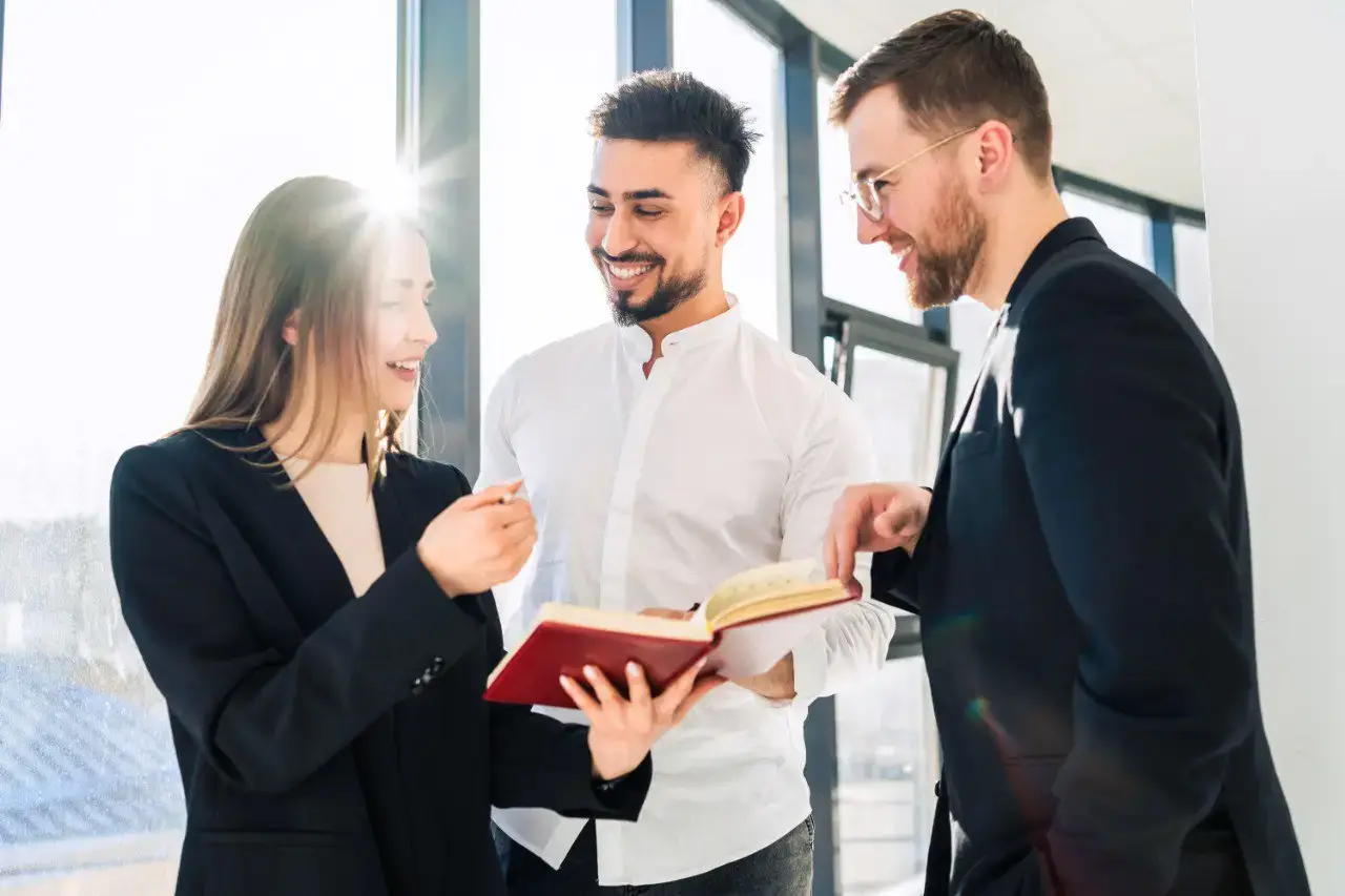 Wide landscape of a sunrise mountain ridge with a solitary walker in silhouette, 3:2 framing to communicate spaciousness and personal growth themes, crisp clarity and natural colors.