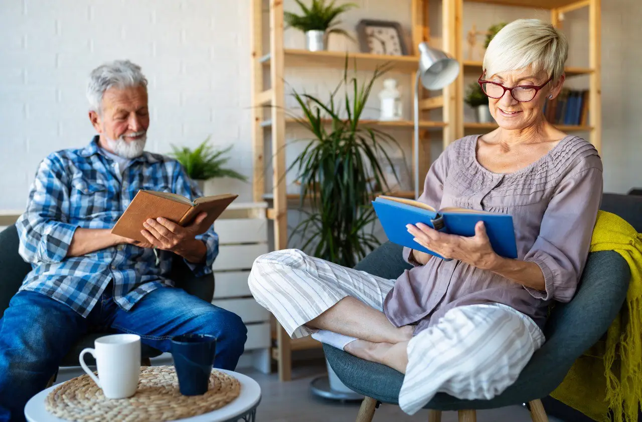Wide landscape of a sunrise mountain ridge with a solitary walker in silhouette, 3:2 framing to communicate spaciousness and personal growth themes, crisp clarity and natural colors.